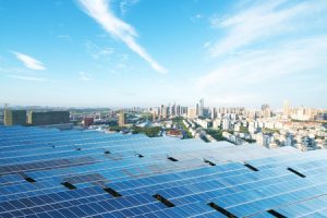 solar panels with Los Angeles cityscape in background